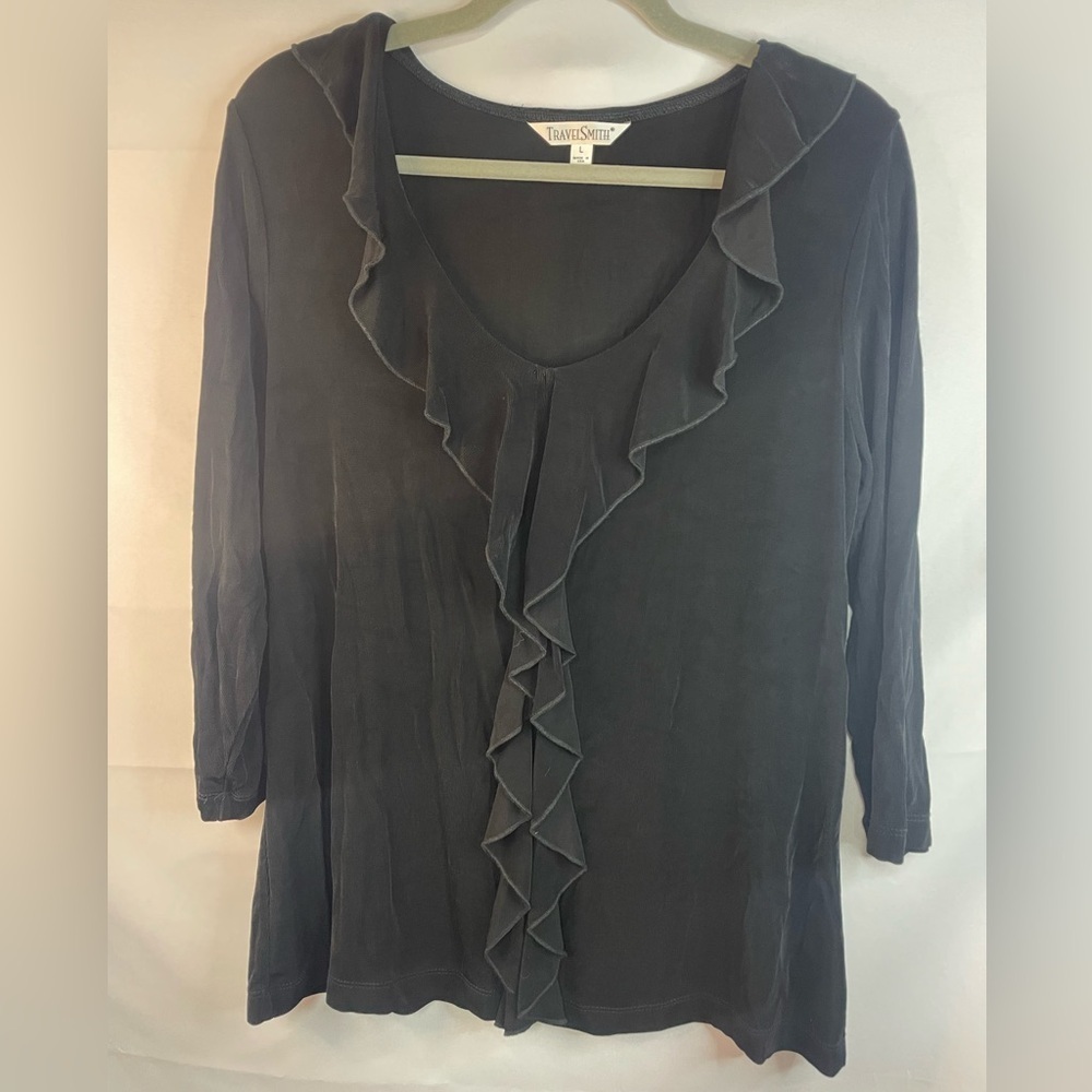 Travelsmith black ribbed slinky blouse with a beautiful ruffle detail!
